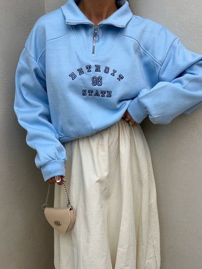 Urban Zip-Collar Embroidered Top