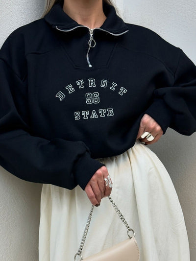 Urban Zip-Collar Embroidered Top