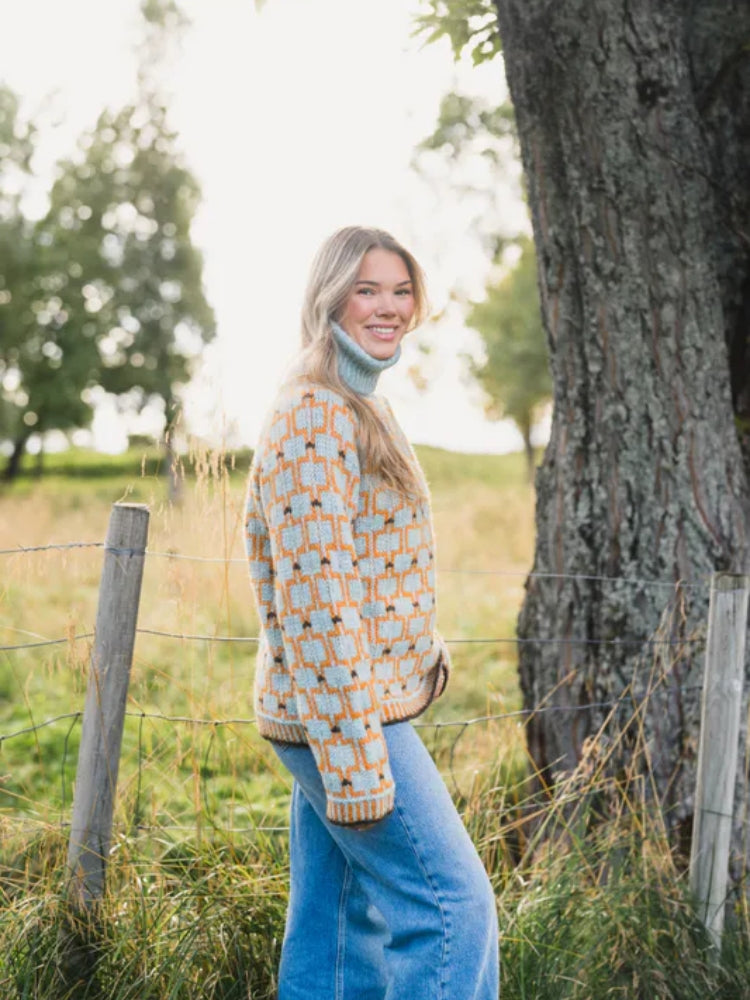Geometric Patterned Turtleneck Sweater